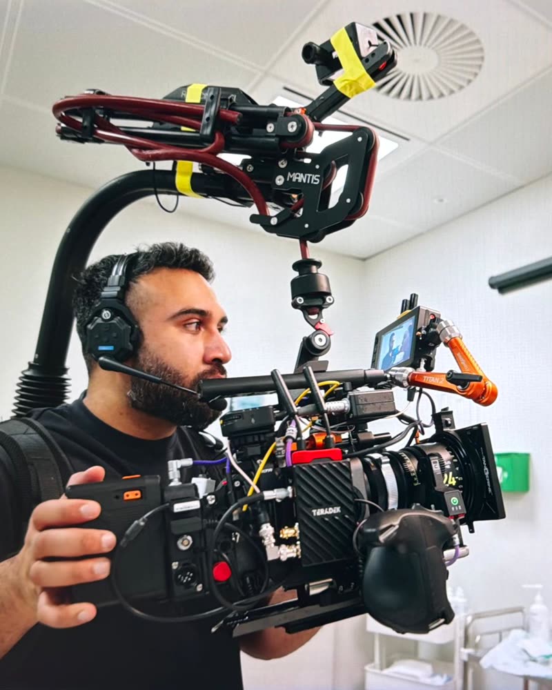 Sulaimaan Haq operating a cinema camera on a clinic shoot