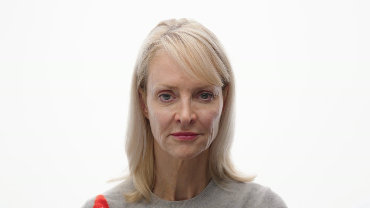 A patient speaking to camera in a documentary interview setup